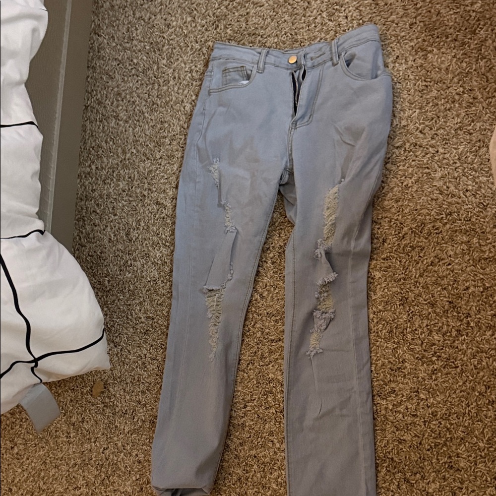 Distressed Light Blue Jeans